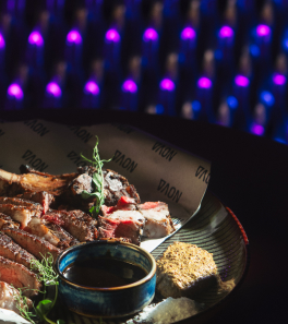 Beef steak on table with ingredients.